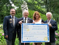 Dunsdon Branch 461  Legion  presents $10,000 to the Stedman Community Hospice.  In the photo are (from left), President Jack Wallace, Poppy Chairman Lloyd Berkeley, Olga Consorti, President of Stedman Community Hospice and Poppy Trustee Harold Welton .